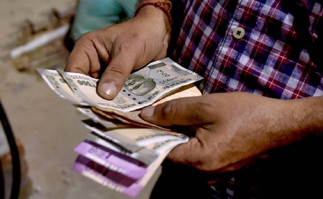Rupee falls 15 paise to 83.34 against US dollar